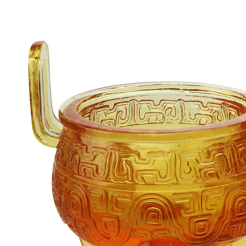 Altın renkli sırlı tripod süsleri