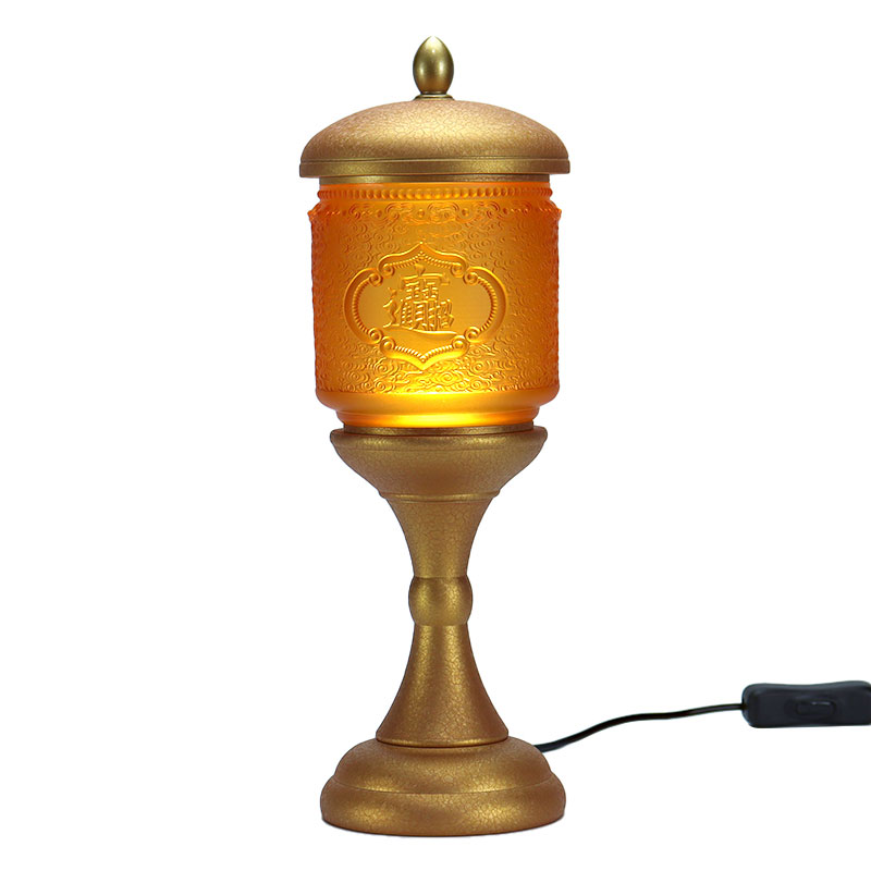 Budist tapınağına zenginlik ve hazine getirmesi için cam adak