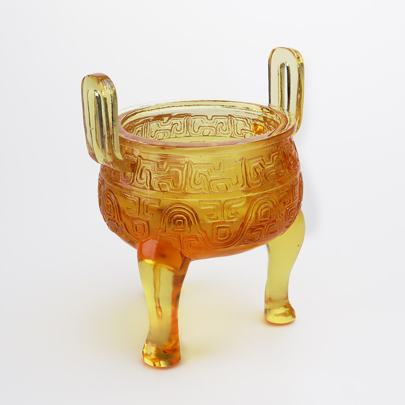 Altın renkli sırlı tripod süsleri