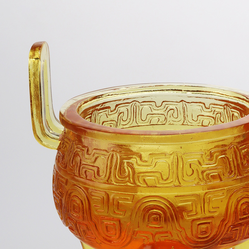 Altın renkli sırlı tripod süsleri